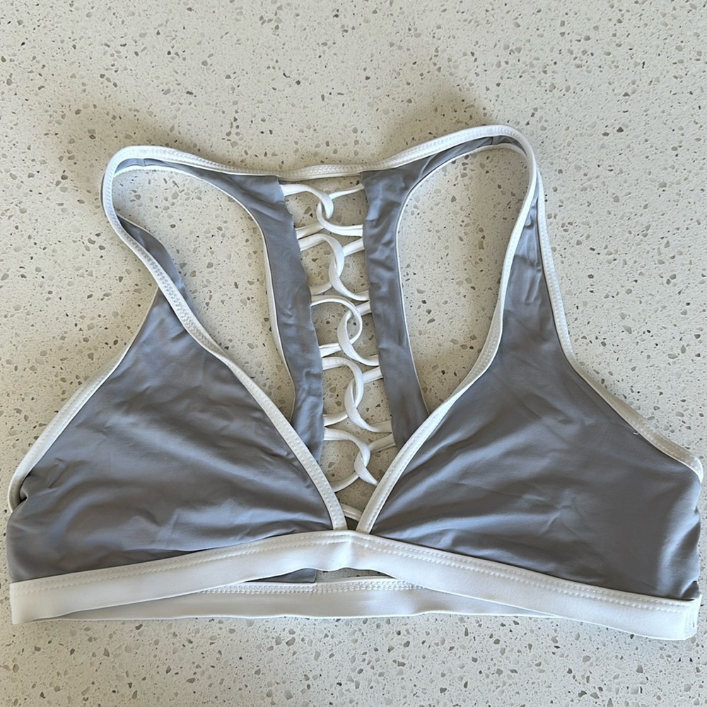 Gray and white L space bikini top